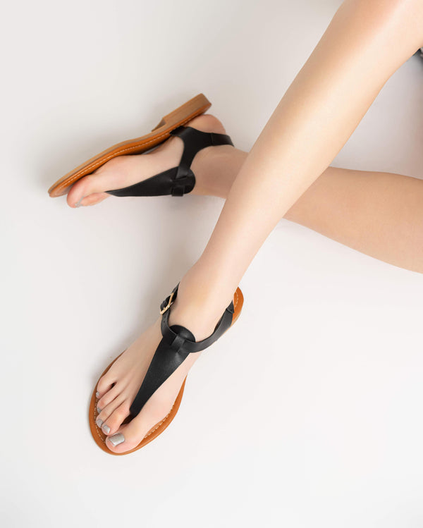 Flat open sandals.